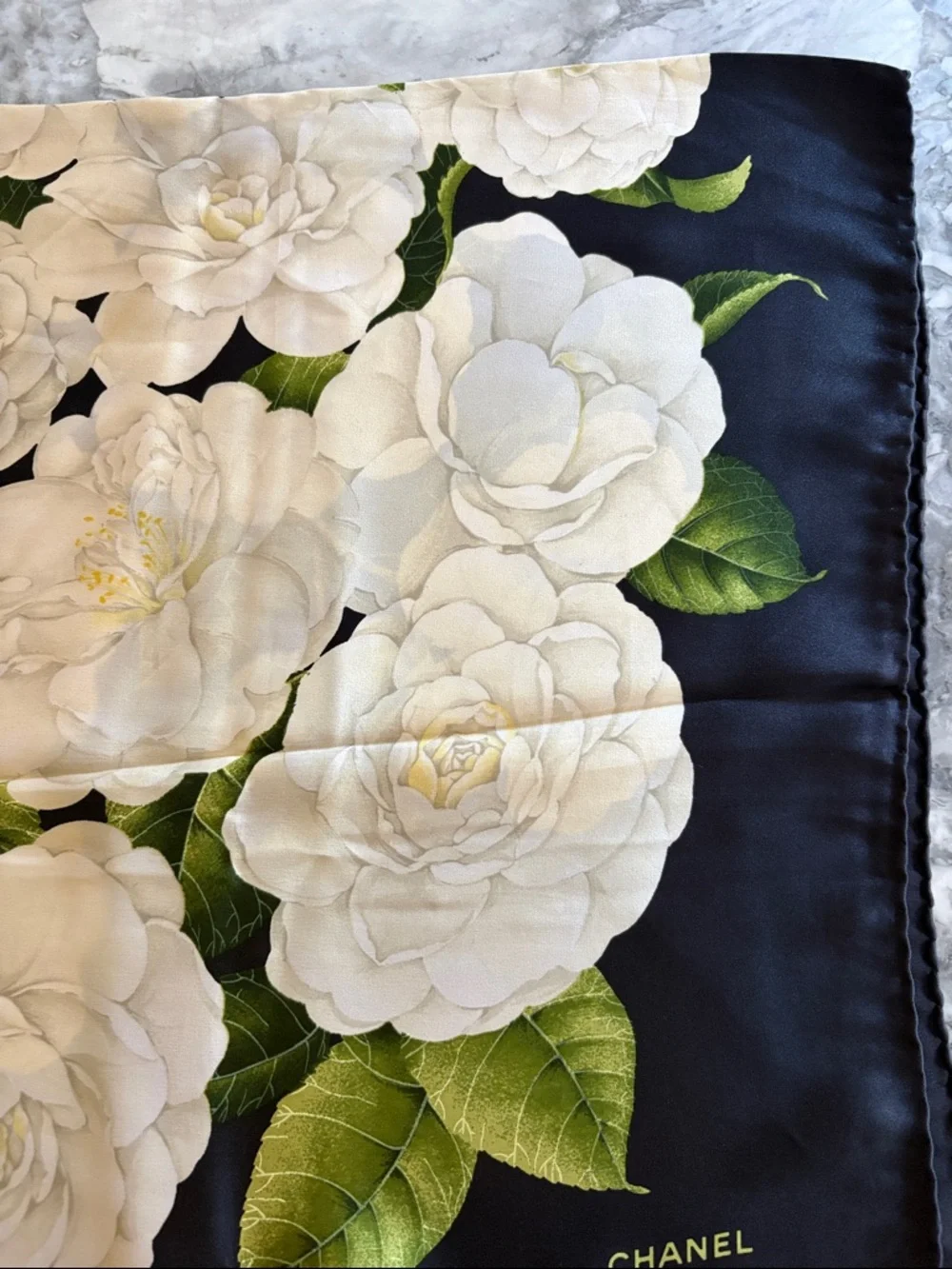 Vintage CHANEL Black Silk Scarf with White Flowers and Green Leaves